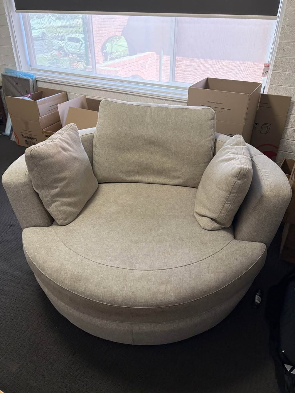 Beige Plush Snuggle Swivel Armchair for Sale